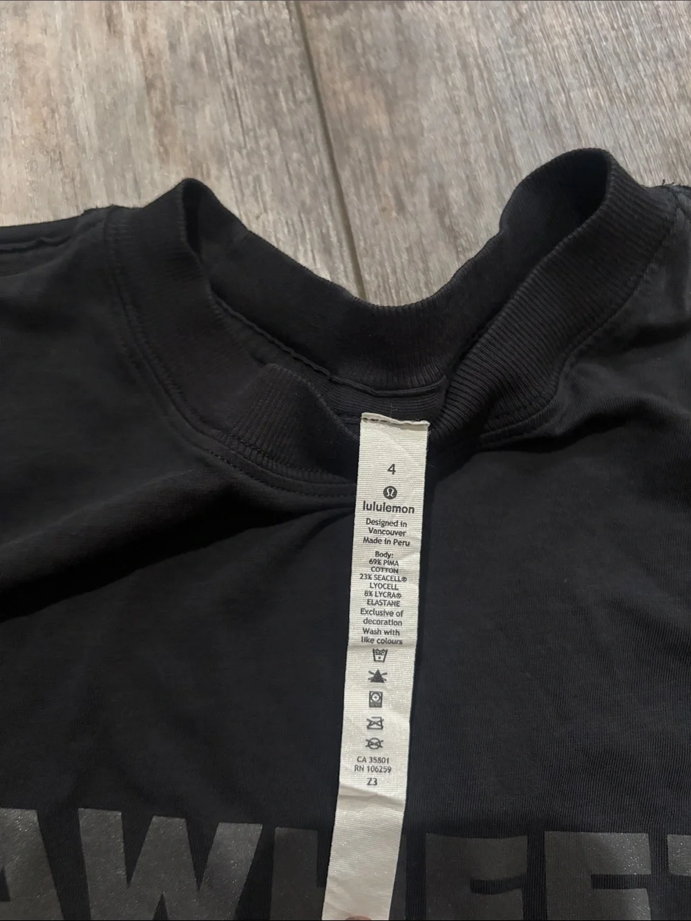 lululemon athletica Black Muscle Tee with 'SEAWHEEZE' Logo